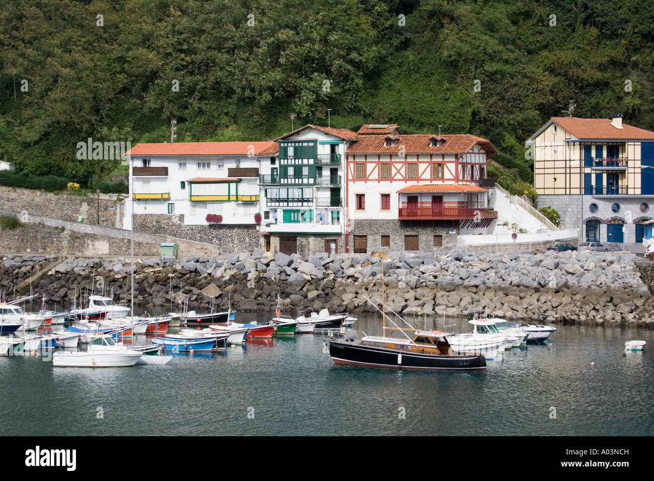 Colourful buildings on waterfront development Mutriku harbour Costa Vasca Euskal Herria Spain Stock Photo