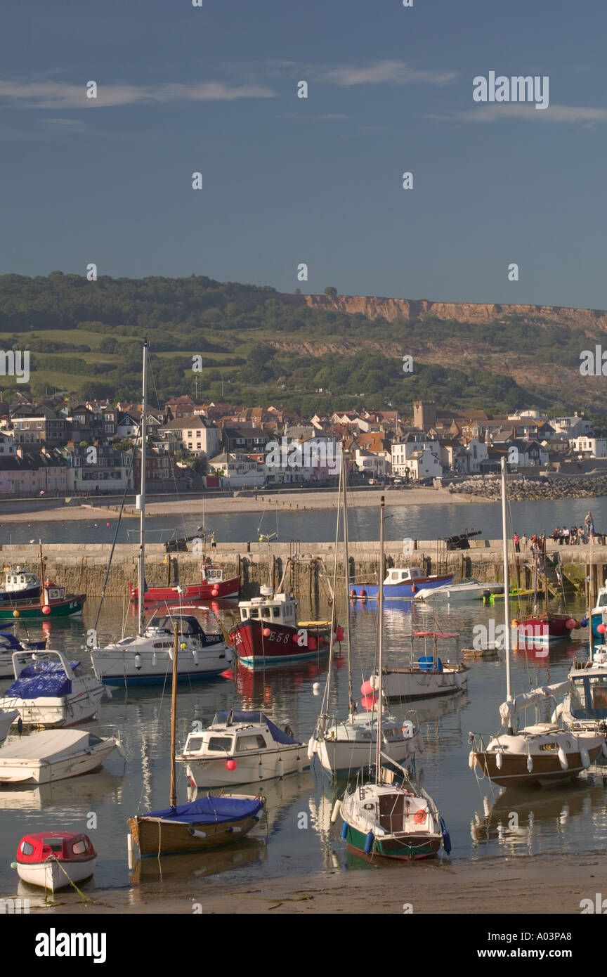 View of Lyme Regis in Dorset across the harbour fromThe Cobb. Stock Photo
