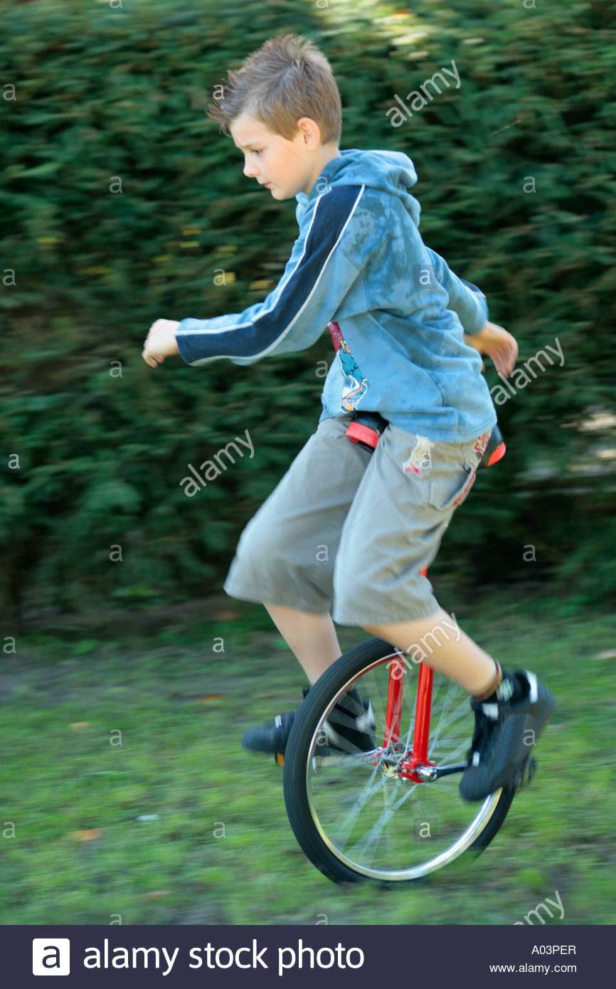 Unicycle Child Stock Photos & Unicycle Child Stock Images Alamy