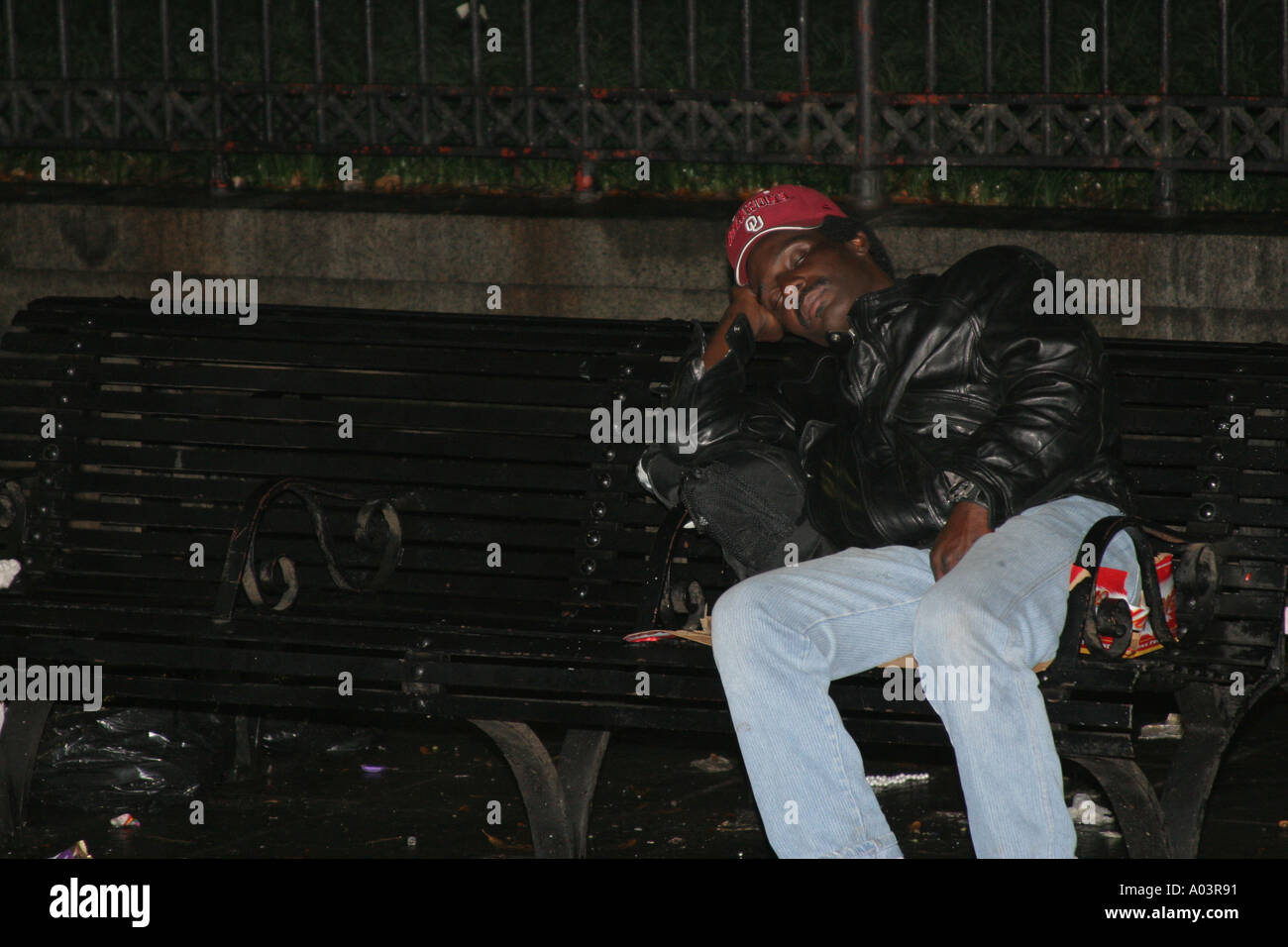 Man sleeping on a bench Stock Photo - Alamy