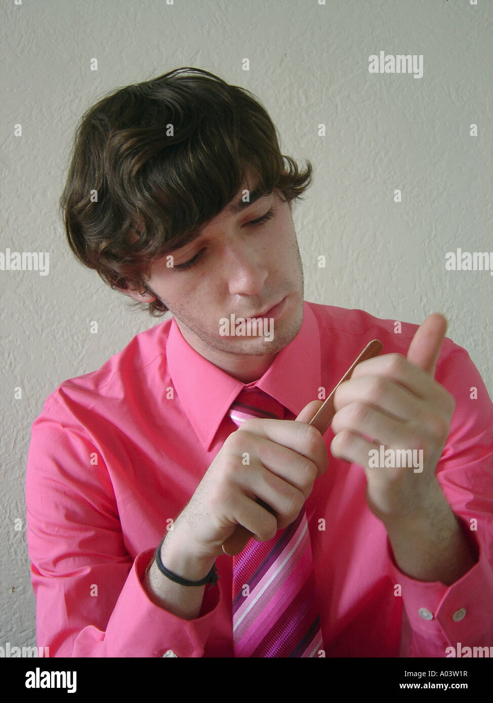Man wearing pink shirt hi-res stock photography and images - Alamy