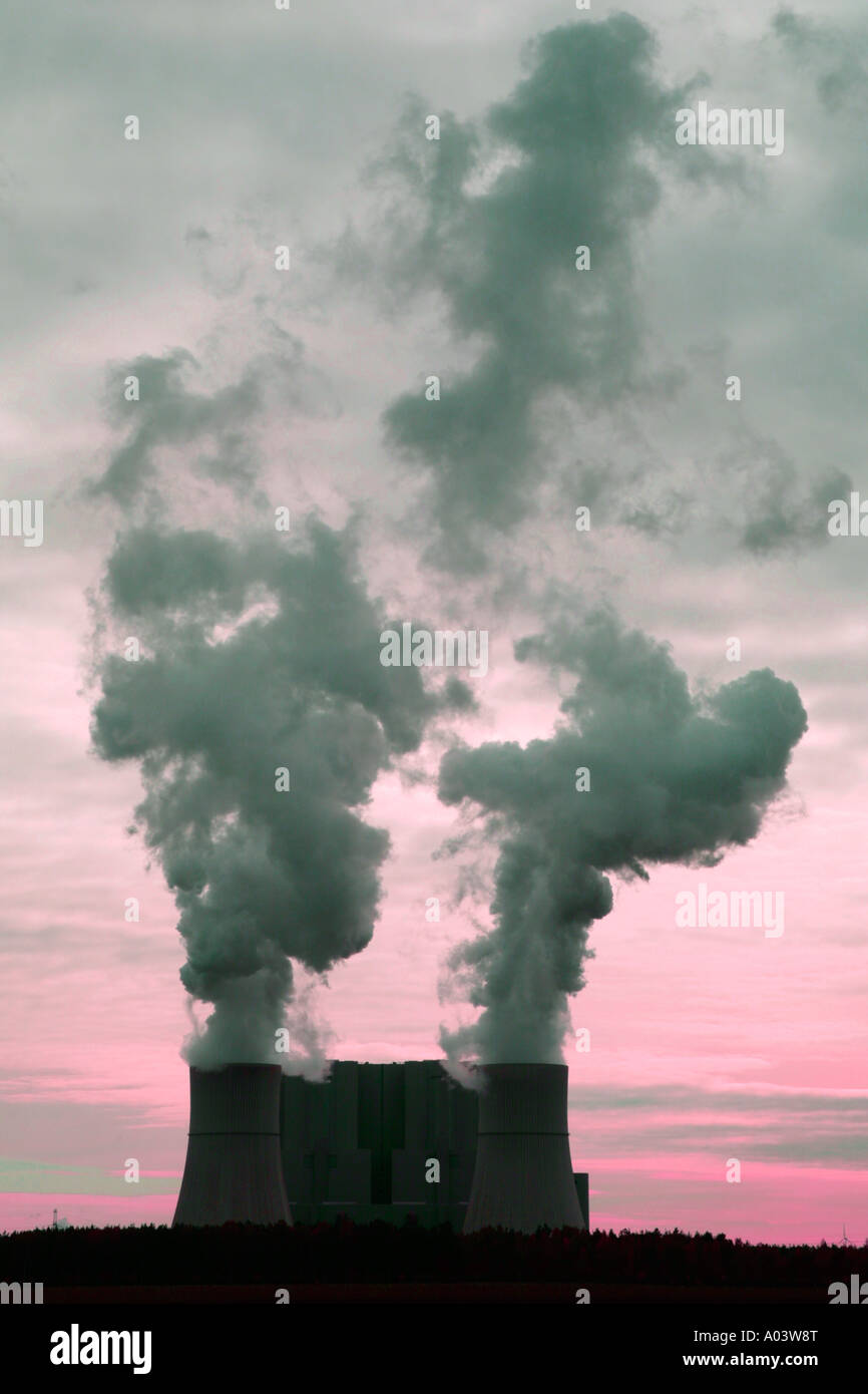 emissions of the power station Schwarze Pumpe in front of a red sky Stock Photo