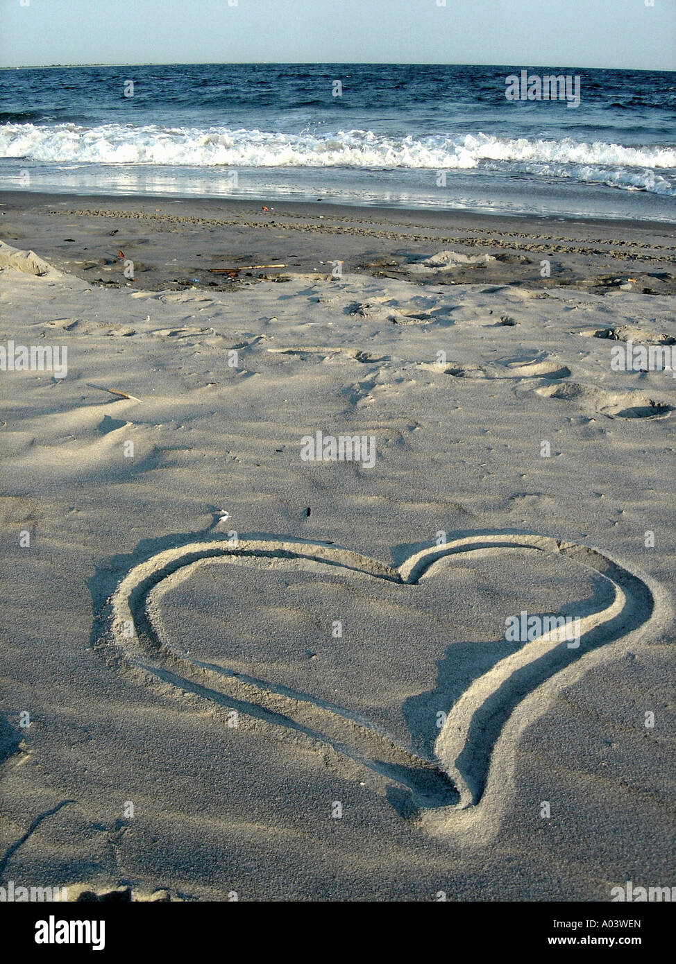 Late Afternoon Beach Scene Of A Heart Shape Drawn In The Sand Copy 