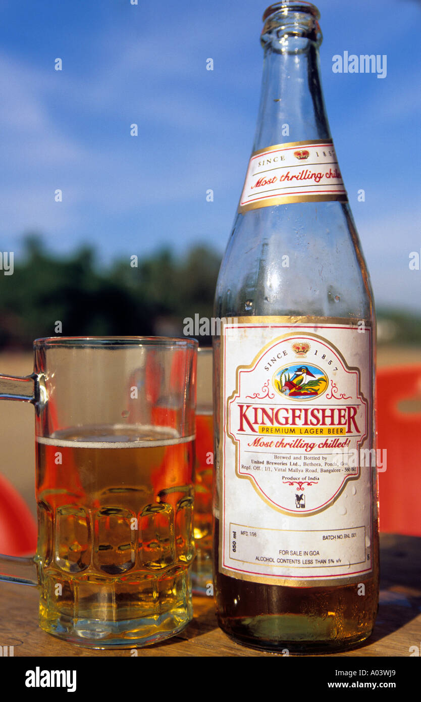 india goa a bottle of local kingfisher beer and a glass Stock ...