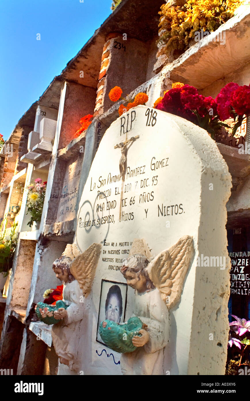 Image of headstone and graves in the municipal cemetery of San Miguel de Allende during the Day of the Dead Stock Photo