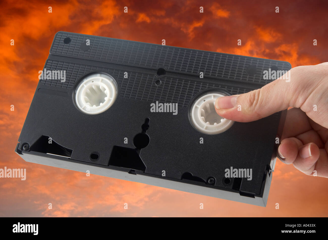 close up of a hand with a video cassette Stock Photo