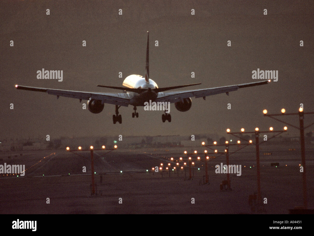 Yellow plane landing hi-res stock photography and images - Alamy
