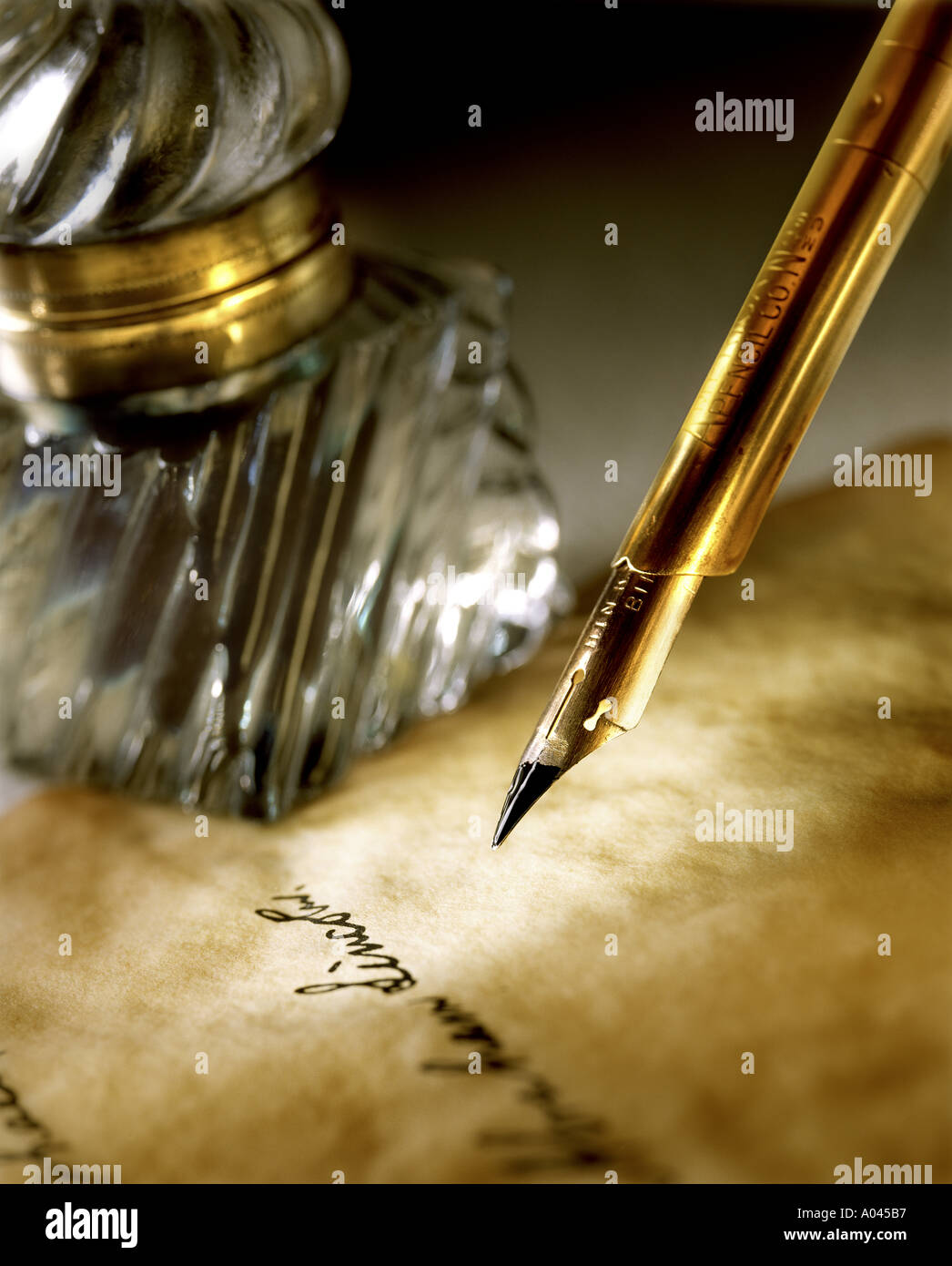 Old Dip Ink Pen and Ink Well on Parchment Stock Photo Alamy