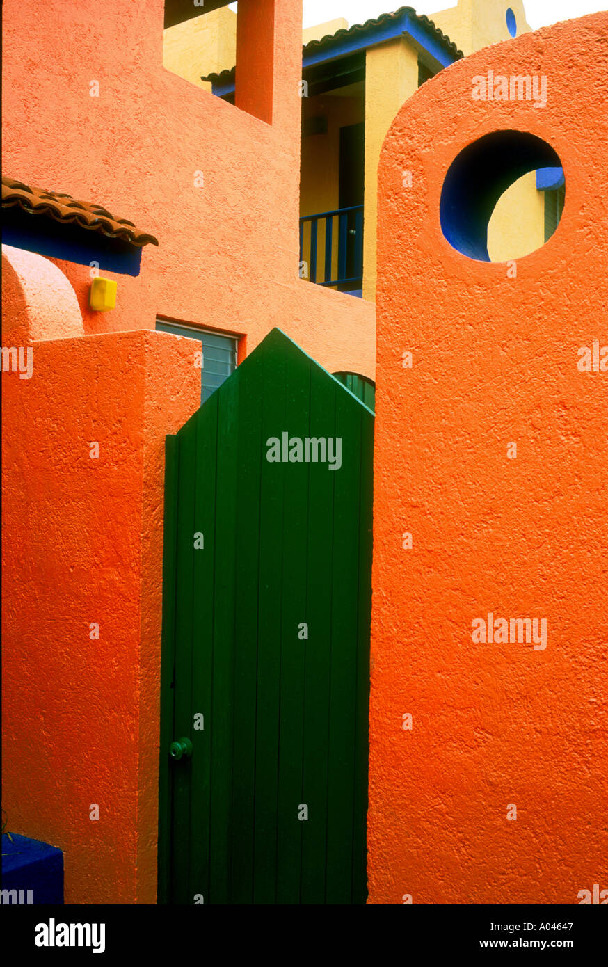 Mexico Progresso green door and colourful orange wall Stock Photo