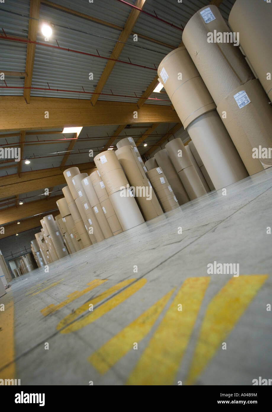 Warehouse containing rolls of paper Stock Photo Alamy