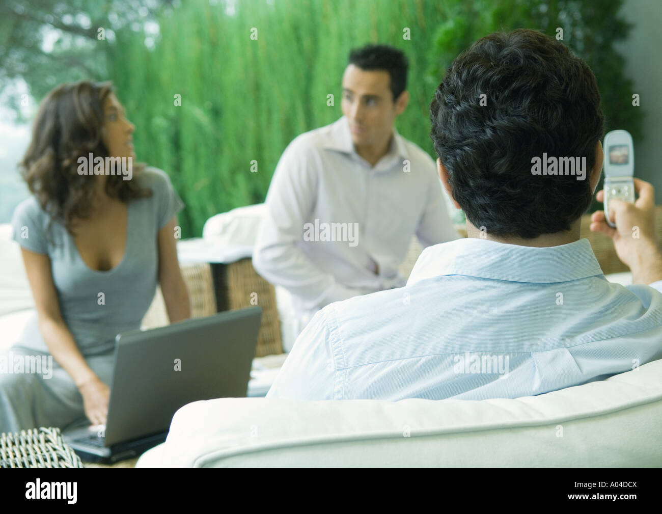 Casually dressed young executives working outdoors Stock Photo