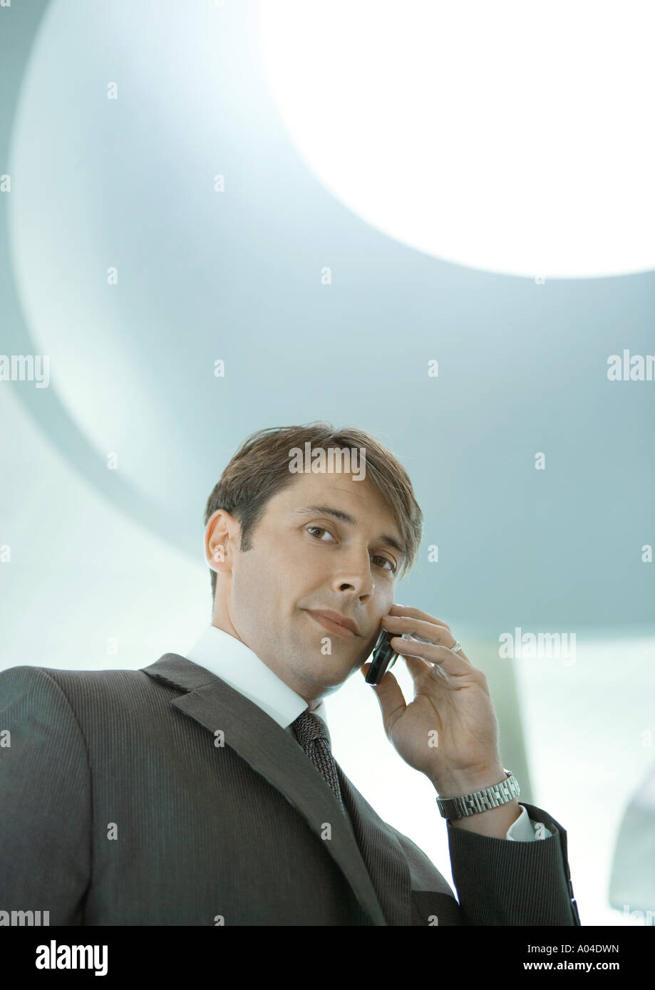 Man using cell phone Stock Photo