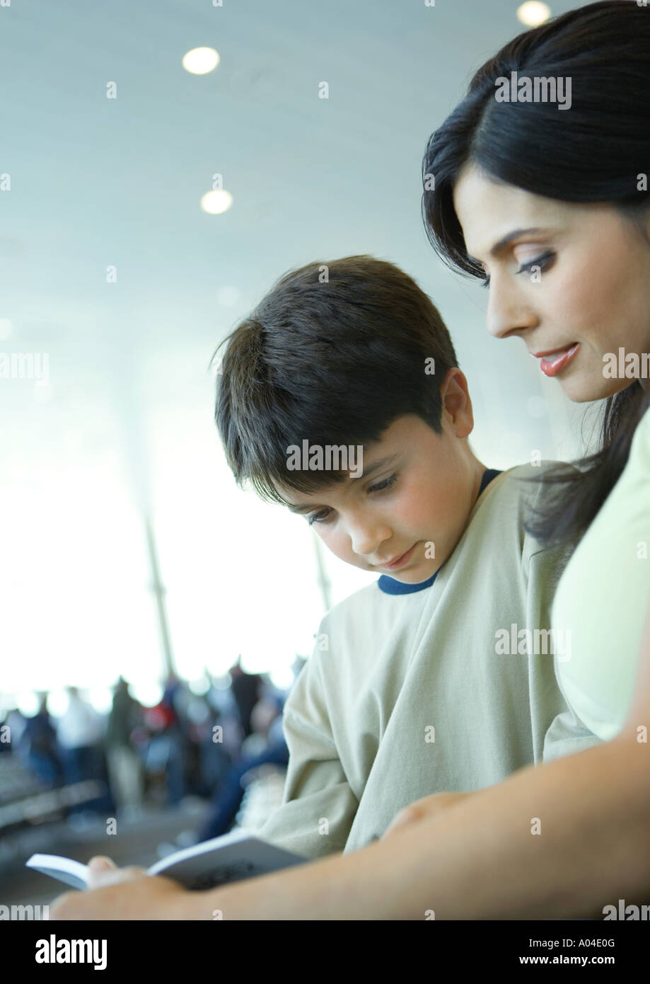 Mother son waiting in airport hi-res stock photography and images - Alamy