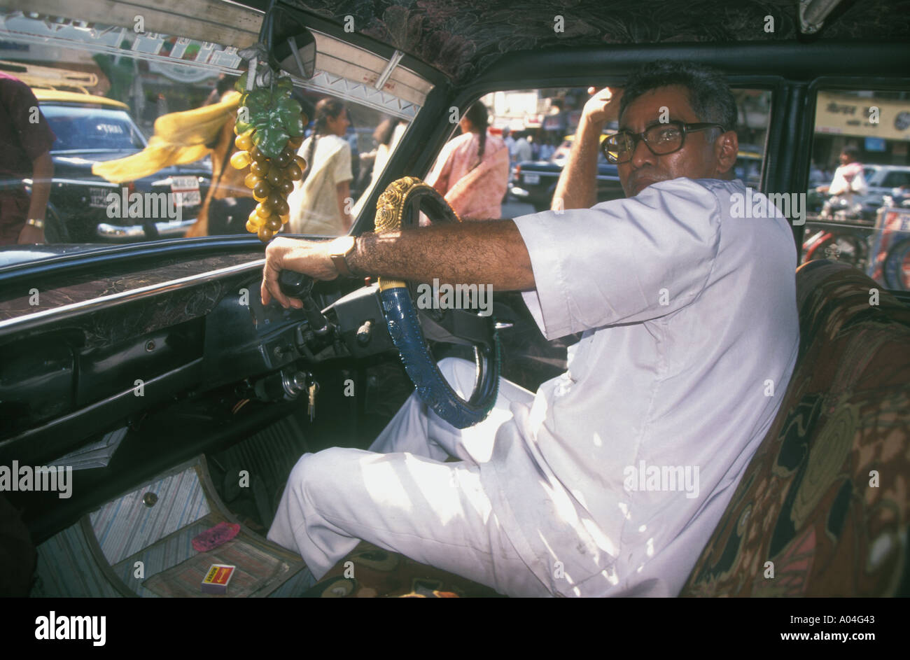 Ambassador Taxi driver Mumbai India Stock Photo