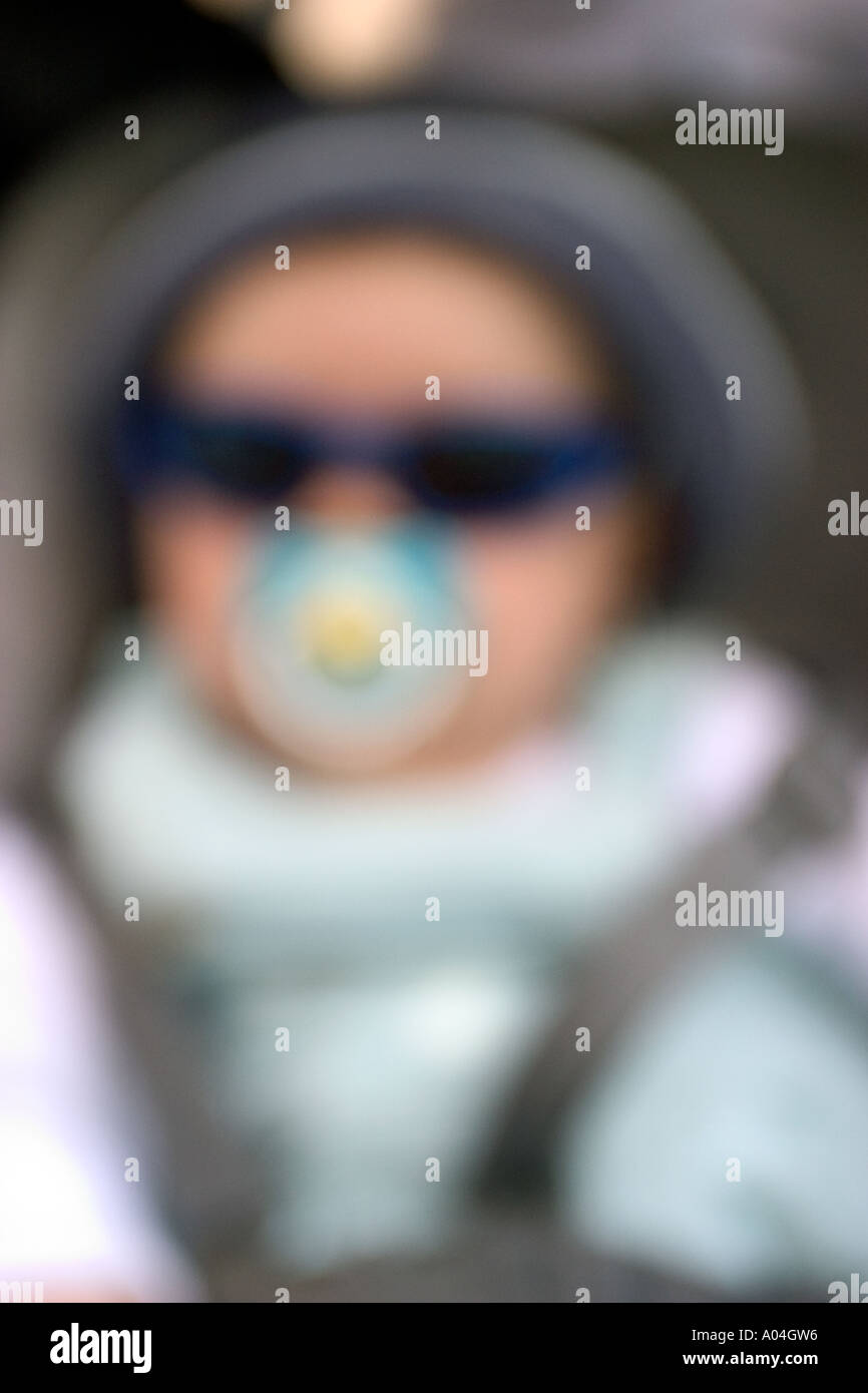 Baby boy sleeping with dummy in mouth Stock Photo Alamy