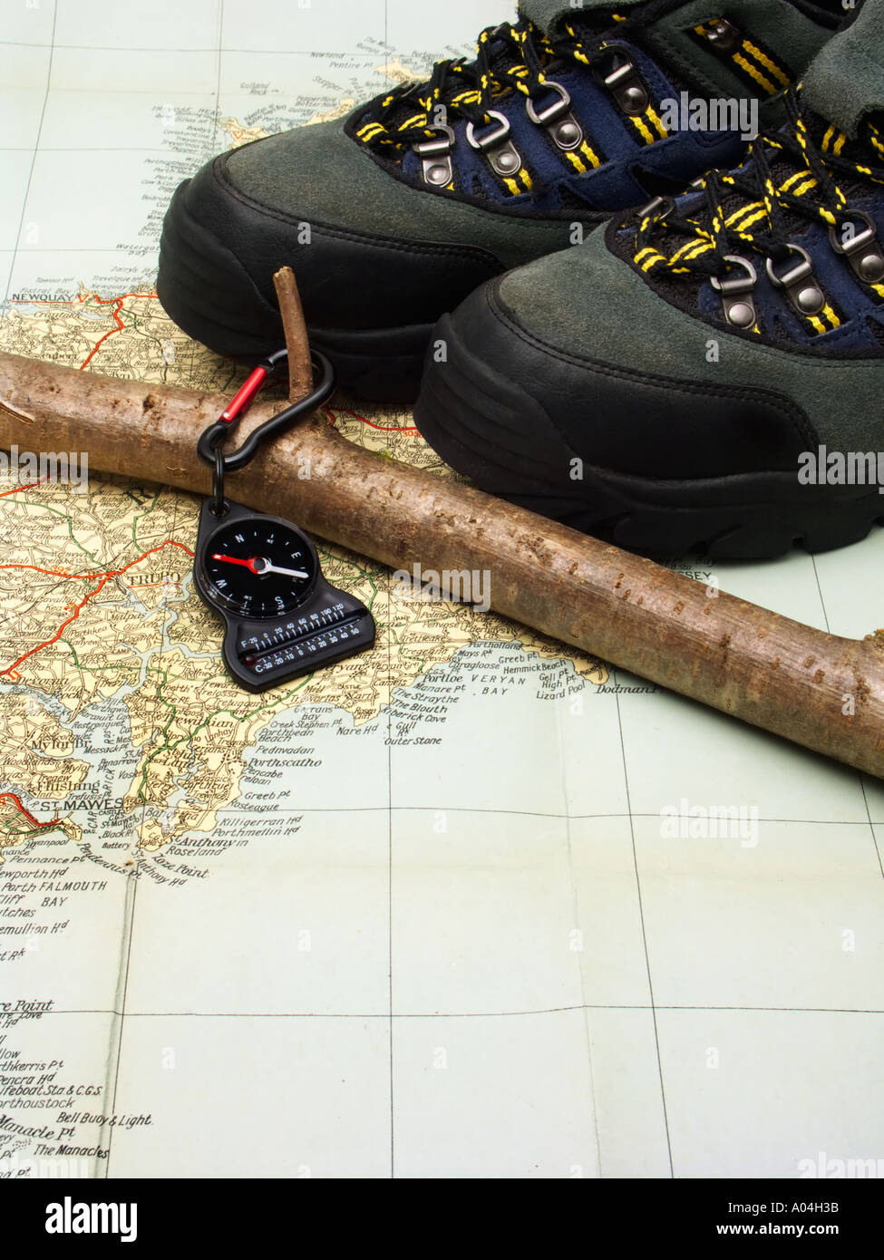 Hiking boots and stick Stock Photo Alamy