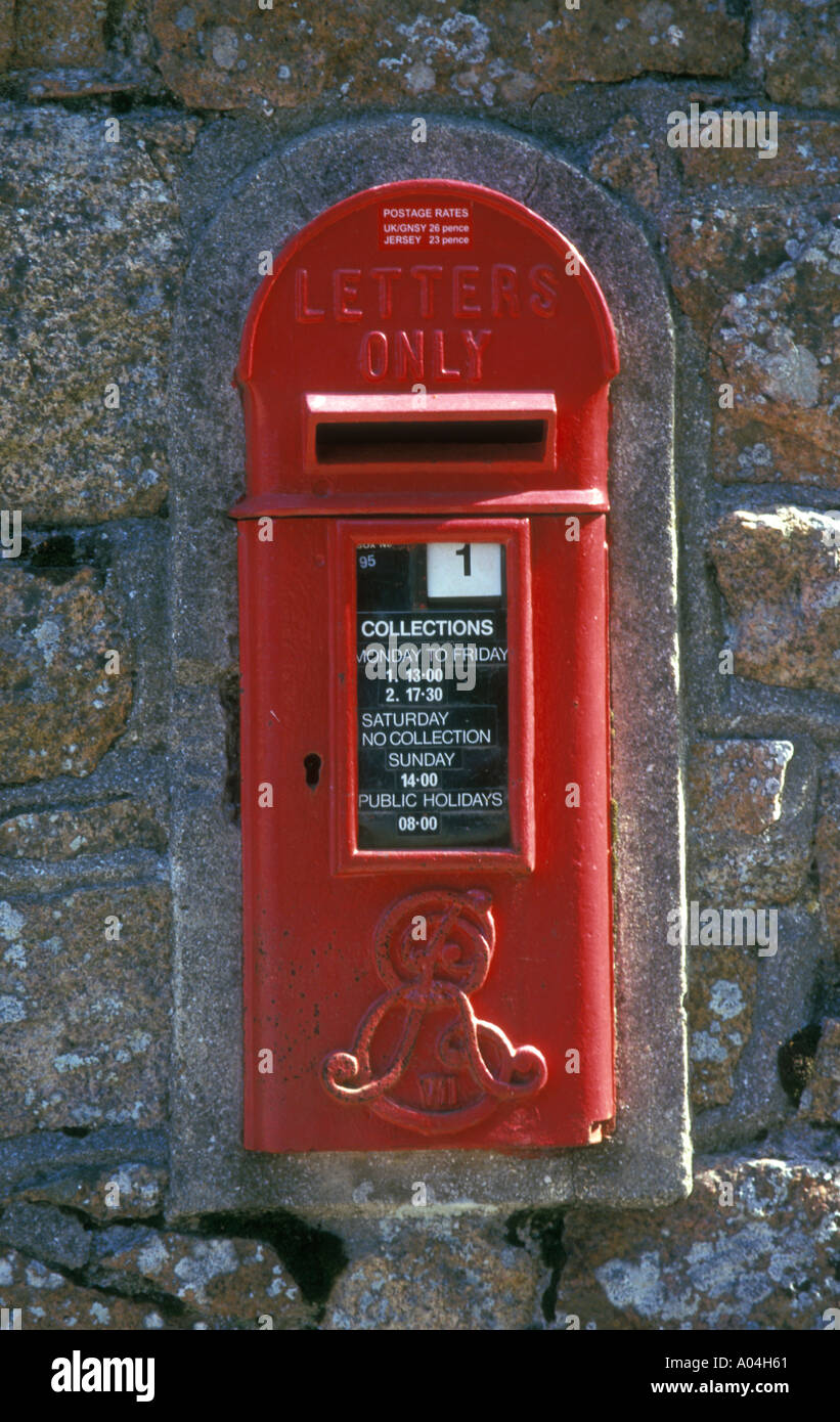 Small red letterbox in granite wall Jersey Channel Islands Stock Photo Alamy