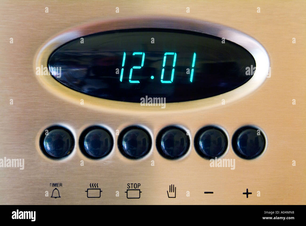 Oven timer on a modern stainless steel oven Stock Photo Alamy