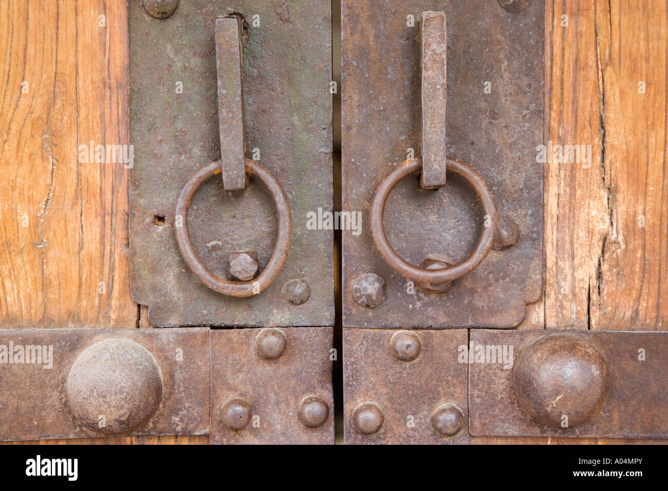 Door knockers on old Spanish double doors Stock Photo Alamy