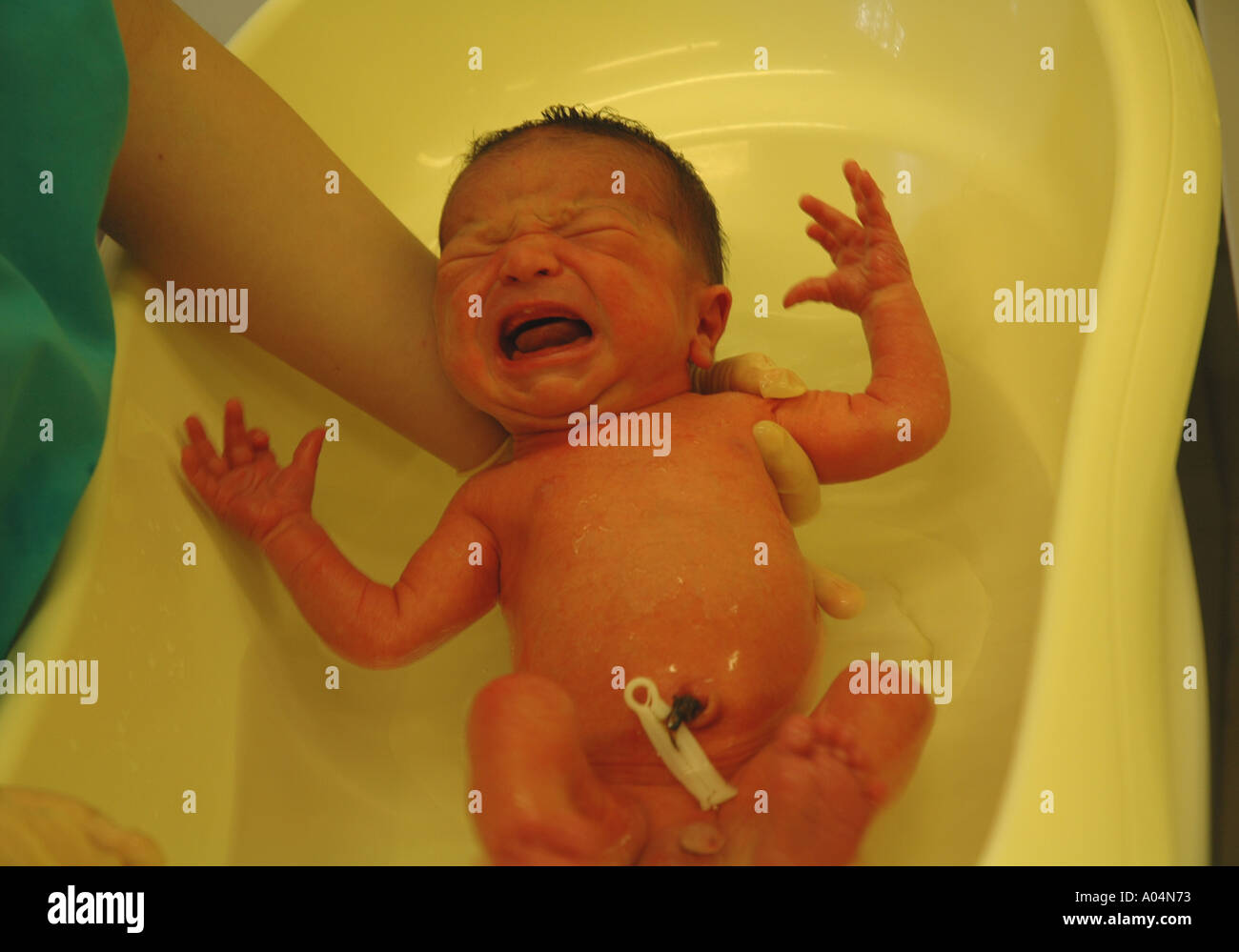 mother-giving-her-baby-a-bath-stock-photo-alamy