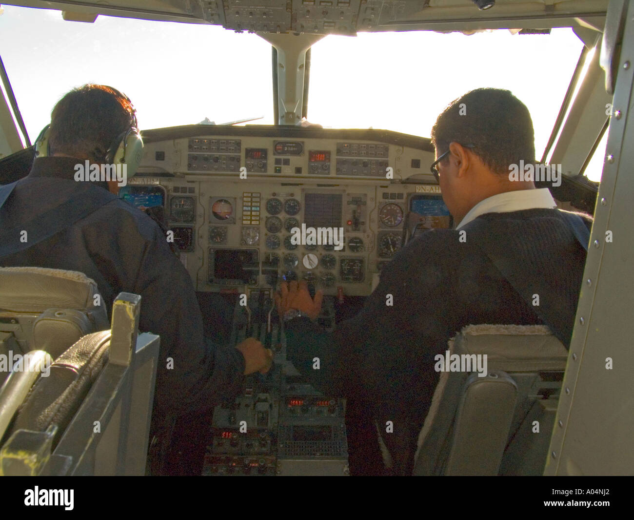 NEPAL Asia  November The pilot and co pilot in the cockpit of a Yeti Airlines SAAB 340B Stock Photo