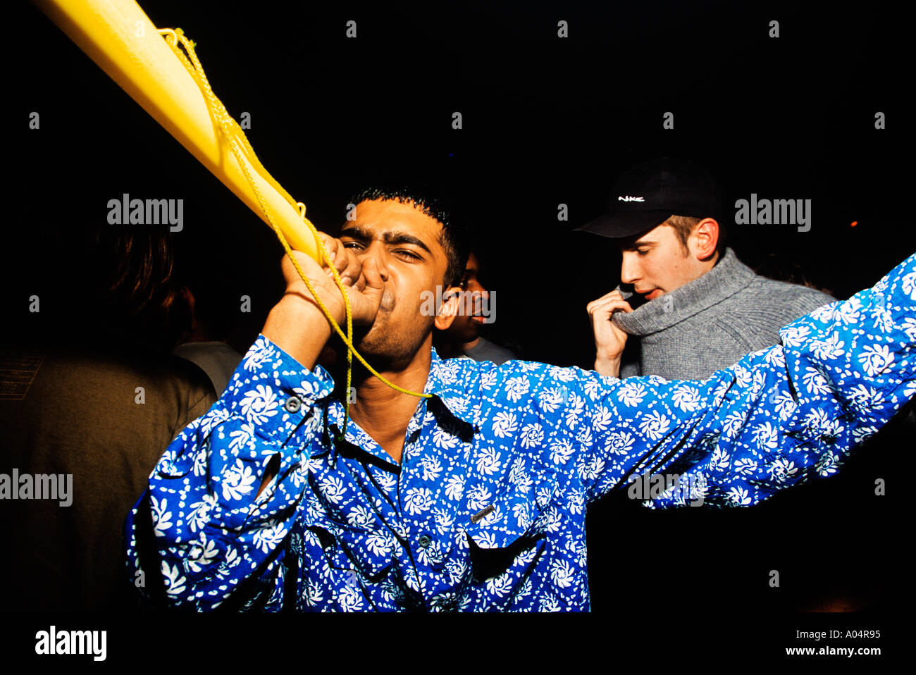 Man with horn at Fabric London Stock Photo