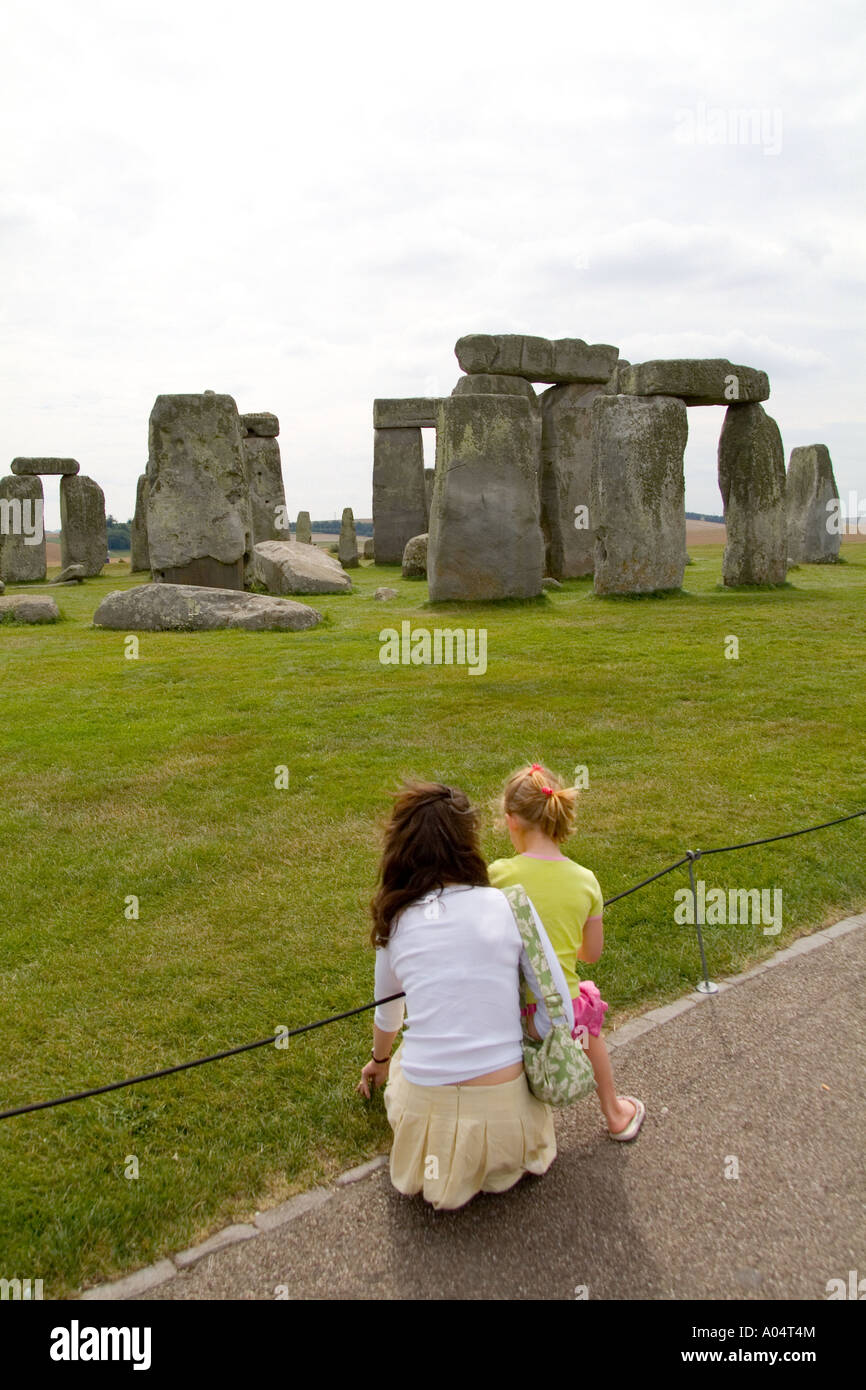 Mother explaining the meaning of the world famous Stonehenge monument