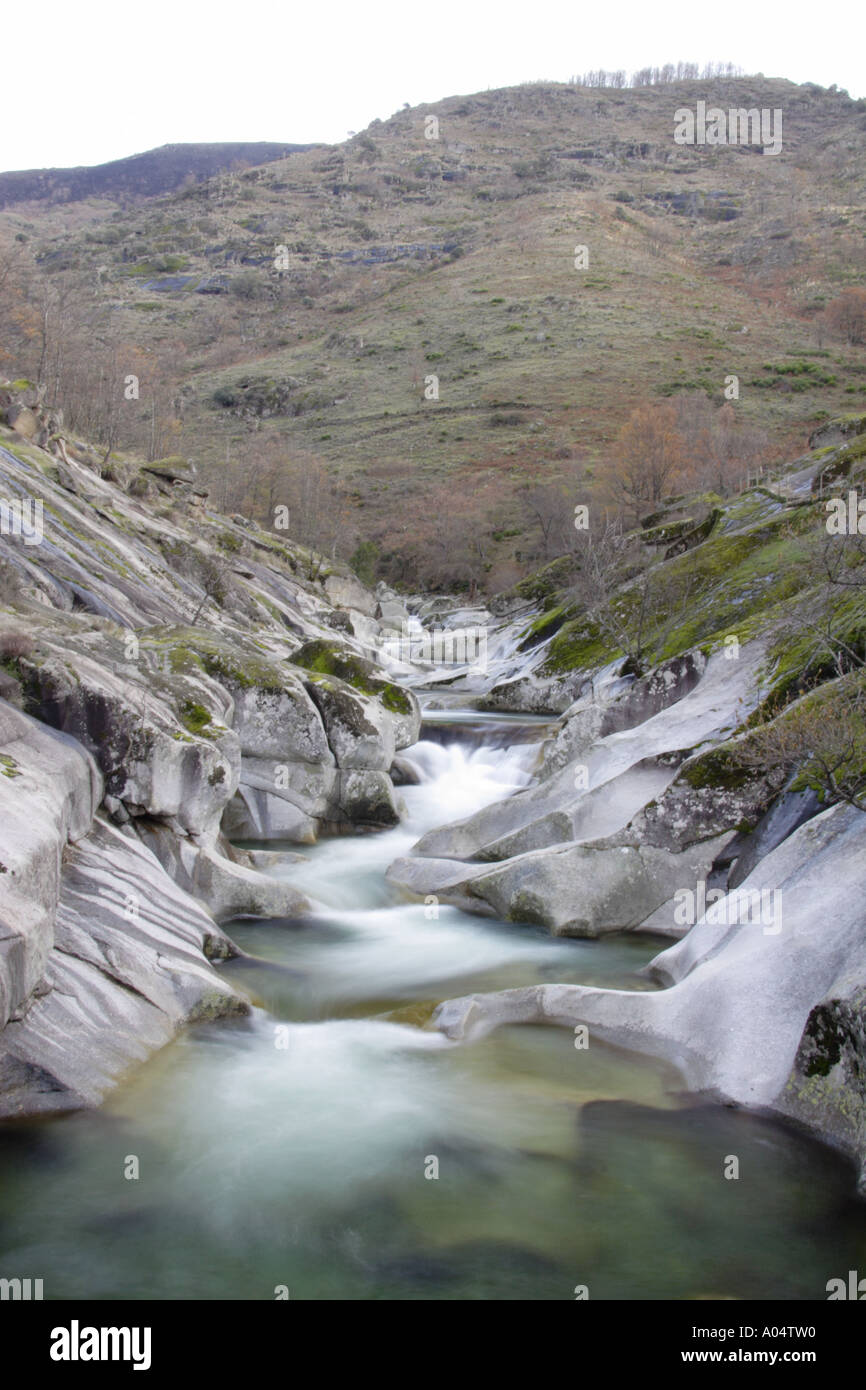 Fast flowing water over rocks in reserva natural de la garganta de los infiernos extremadura spain Stock Photo