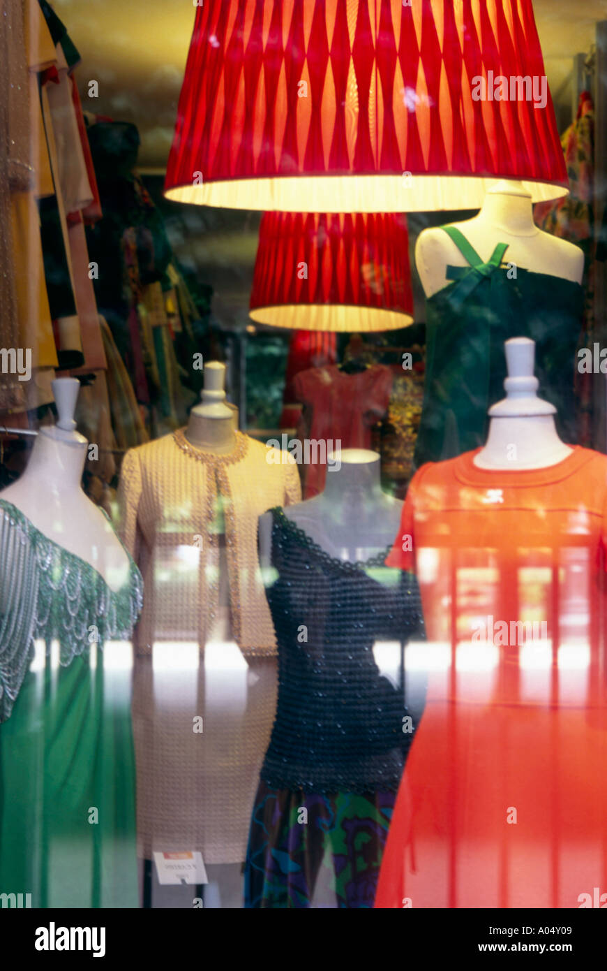 The window of the world famous vintage clothing store Didier Ludot located in the Royal Palace are of Paris, France. Stock Photo