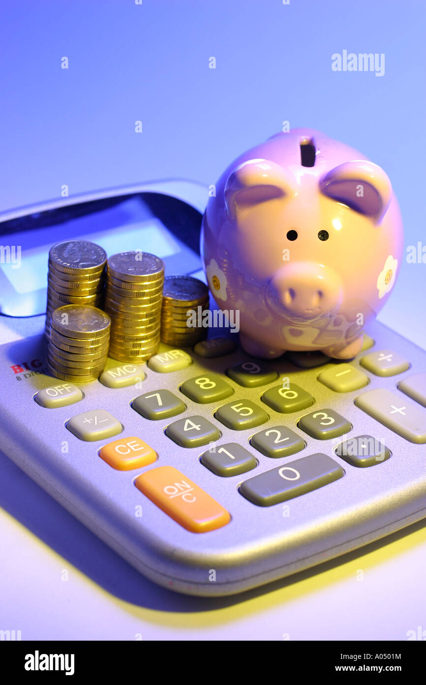 Coins piggy bank calculator hi-res stock photography and images - Alamy