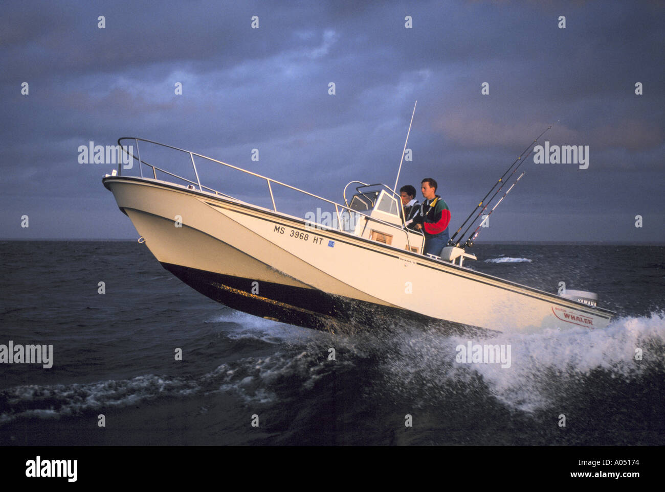 Boat in rough water Stock Photo Alamy