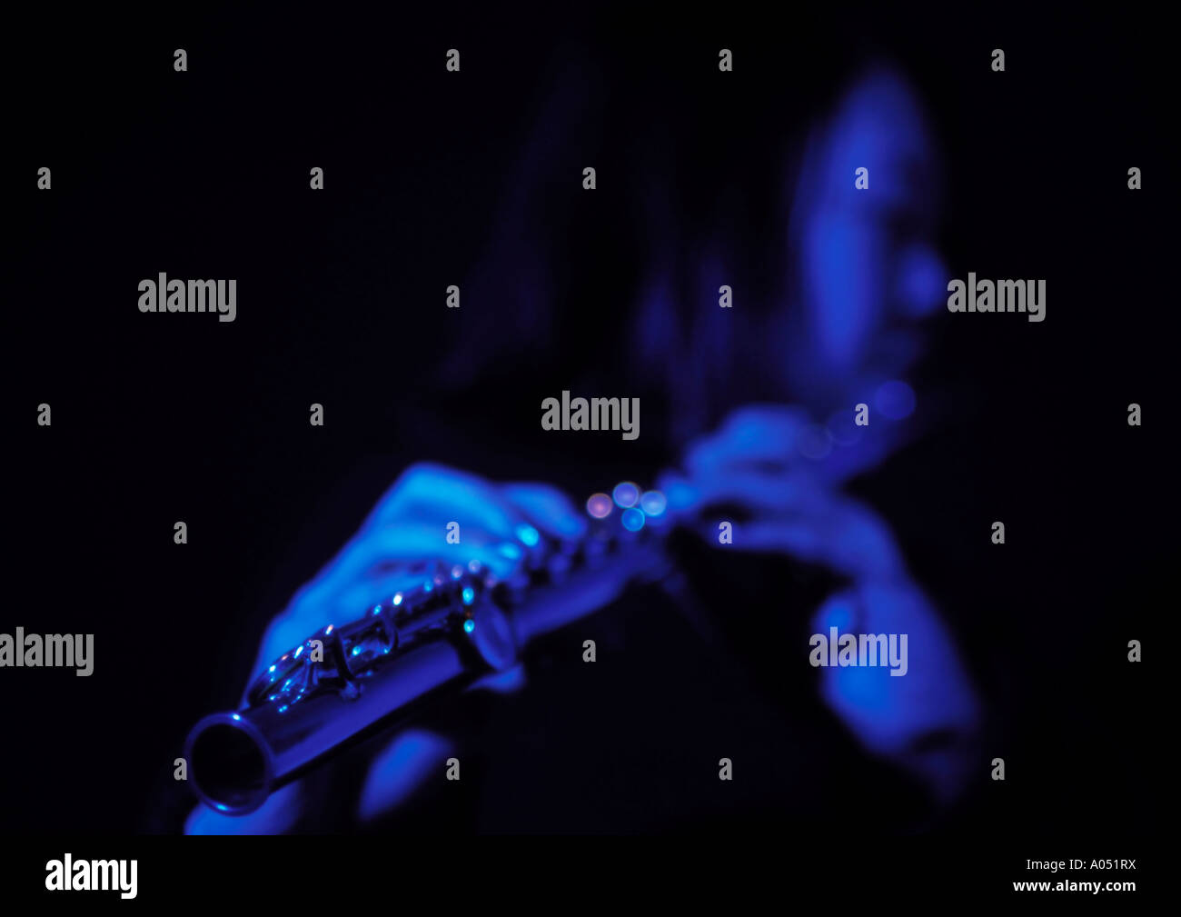 woman playing flute Stock Photo Alamy