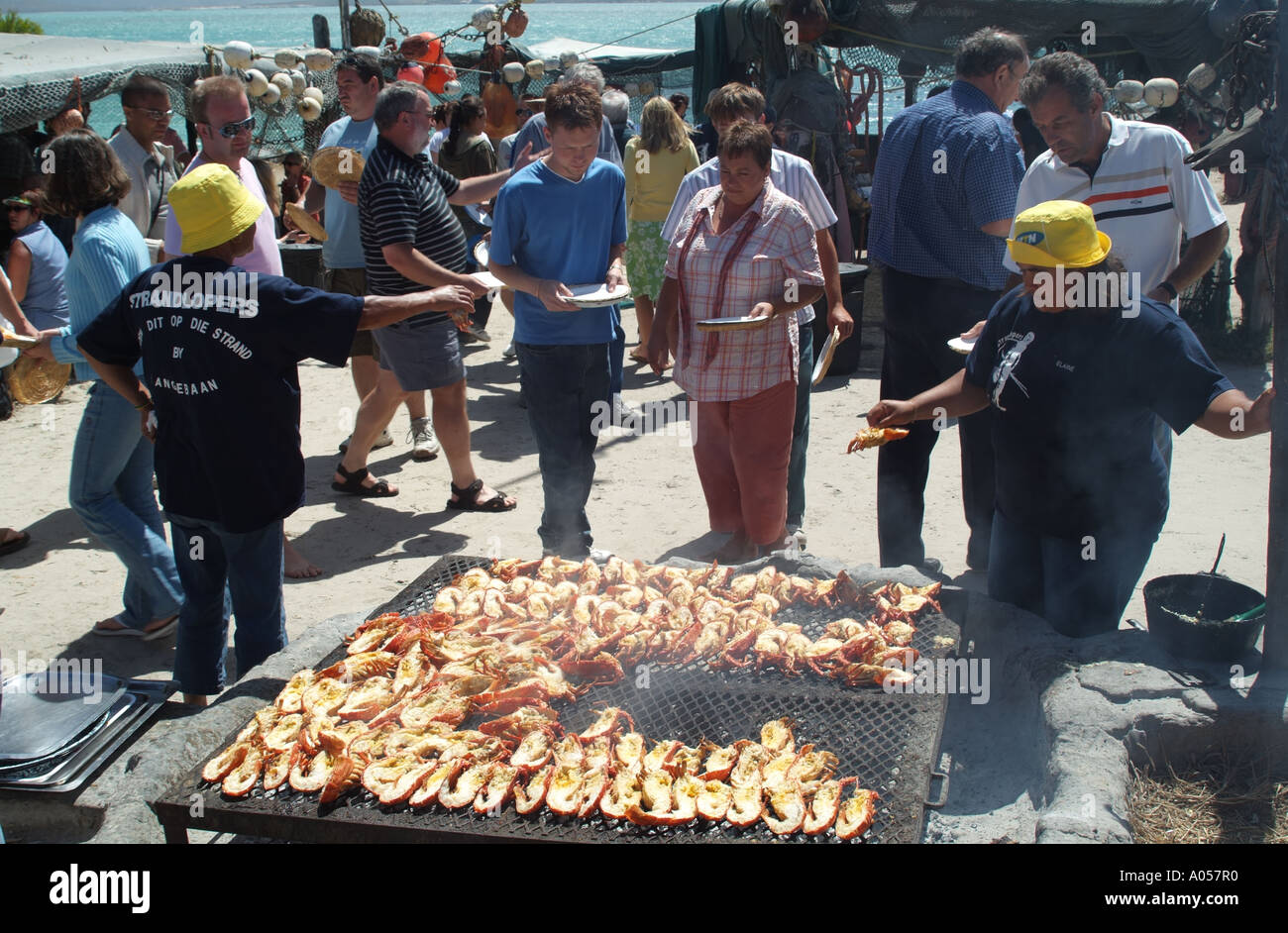 Crayfish being grilled for guests on open fire Langebaan west coast Souther Africa RSA Stock Photo