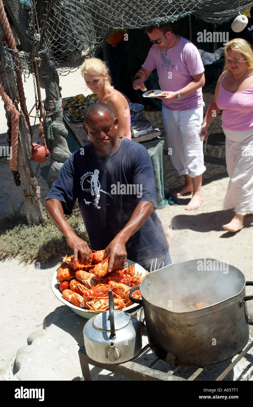 Crayfish being cooked in a large pot over an open fire South Africa RSA