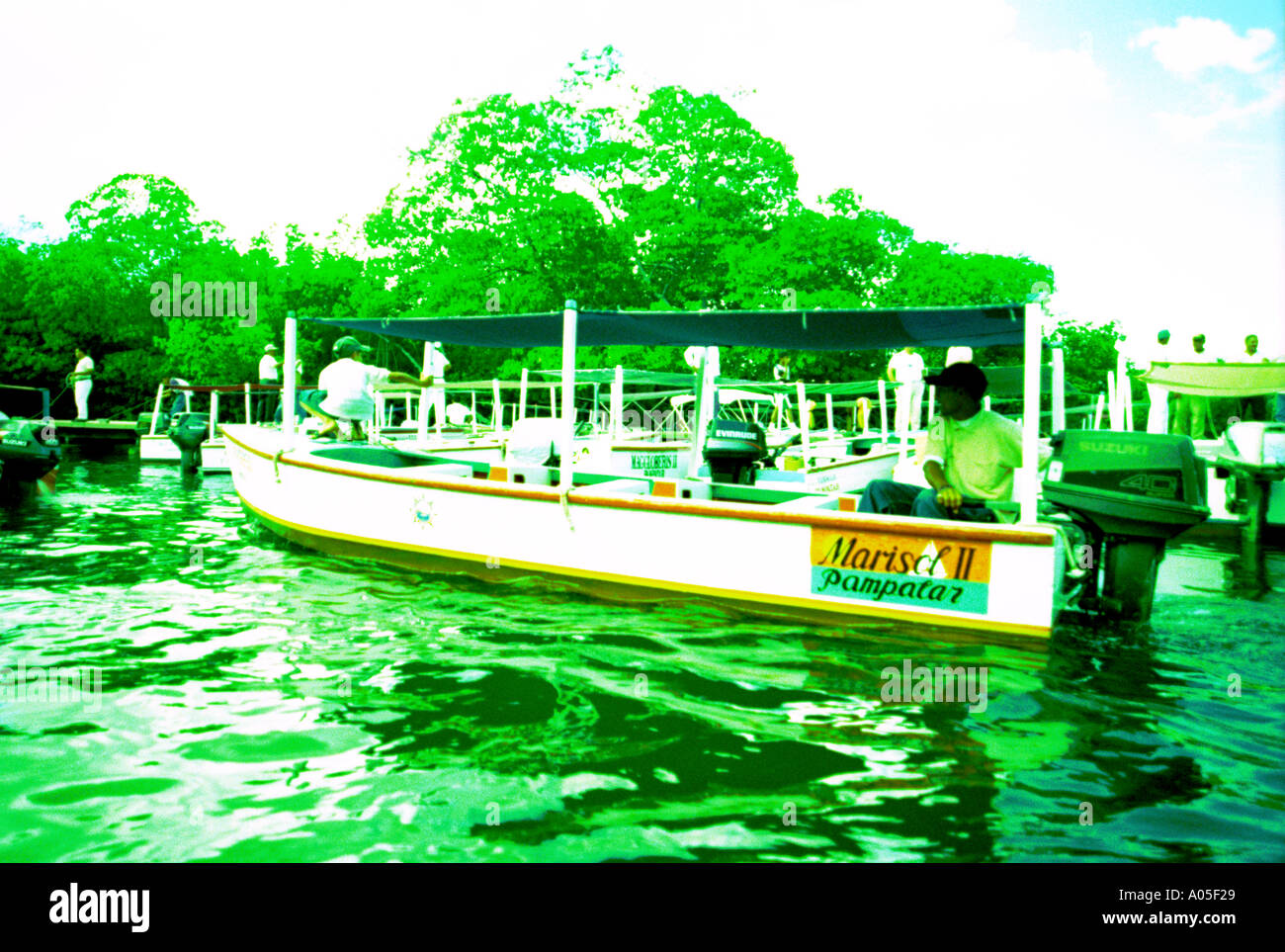 Tour boat operators lagoon Margarita Island 300 Stock Photo Alamy