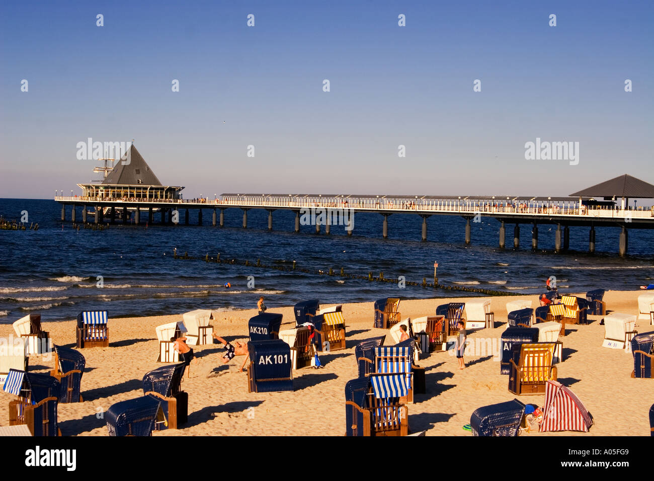 Usedom Heringsdorf beach chairs wind shelter background jetty Stock Photo