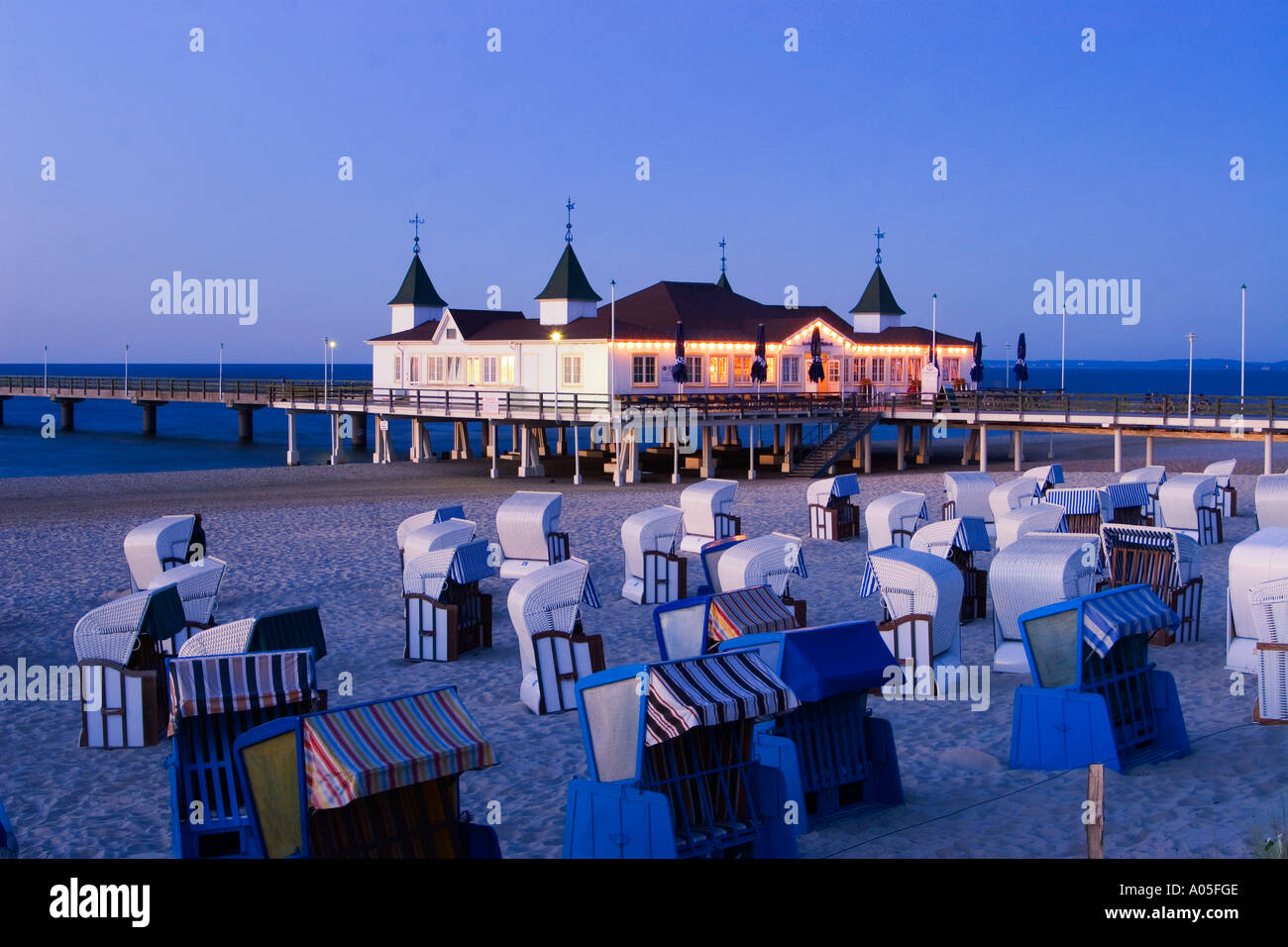 Usedom Ahlbeck beach chairs art nouveau wooden pier twilight Stock Photo