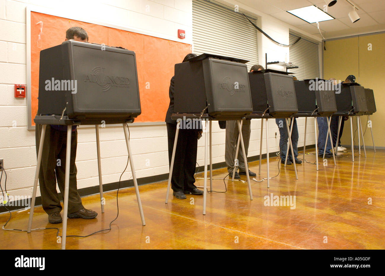 Voters cast ballots in presidential election using a touch screen at the Langston Brown Community Ctr in Arlington Virginia Stock Photo