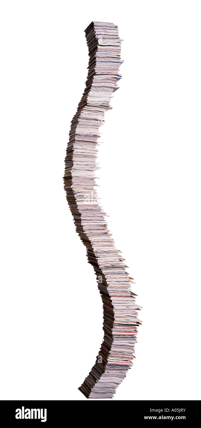 A giant wobbly stack of magazines Stock Photo