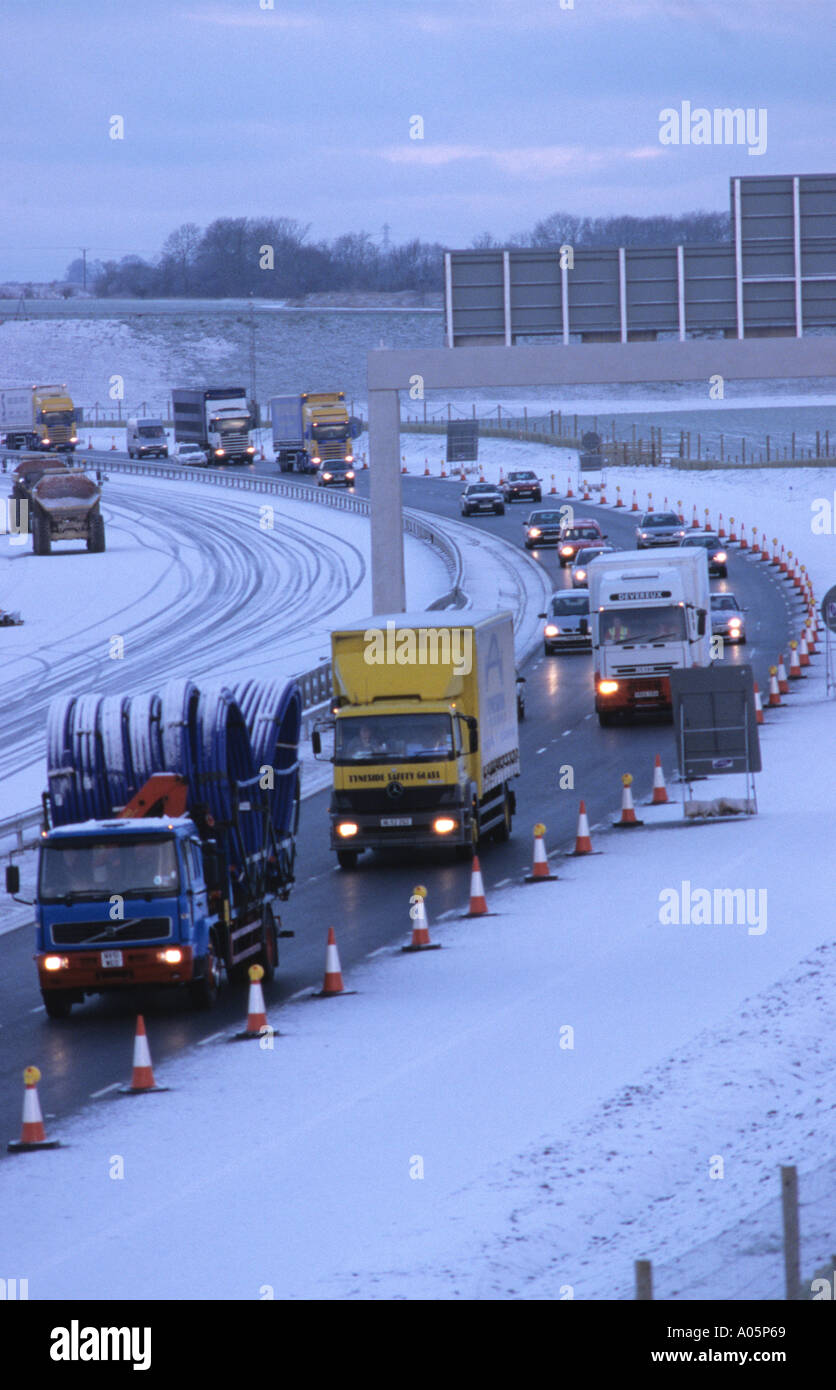 heavy traffic struggling through blizzard winter conditions on a1 m1