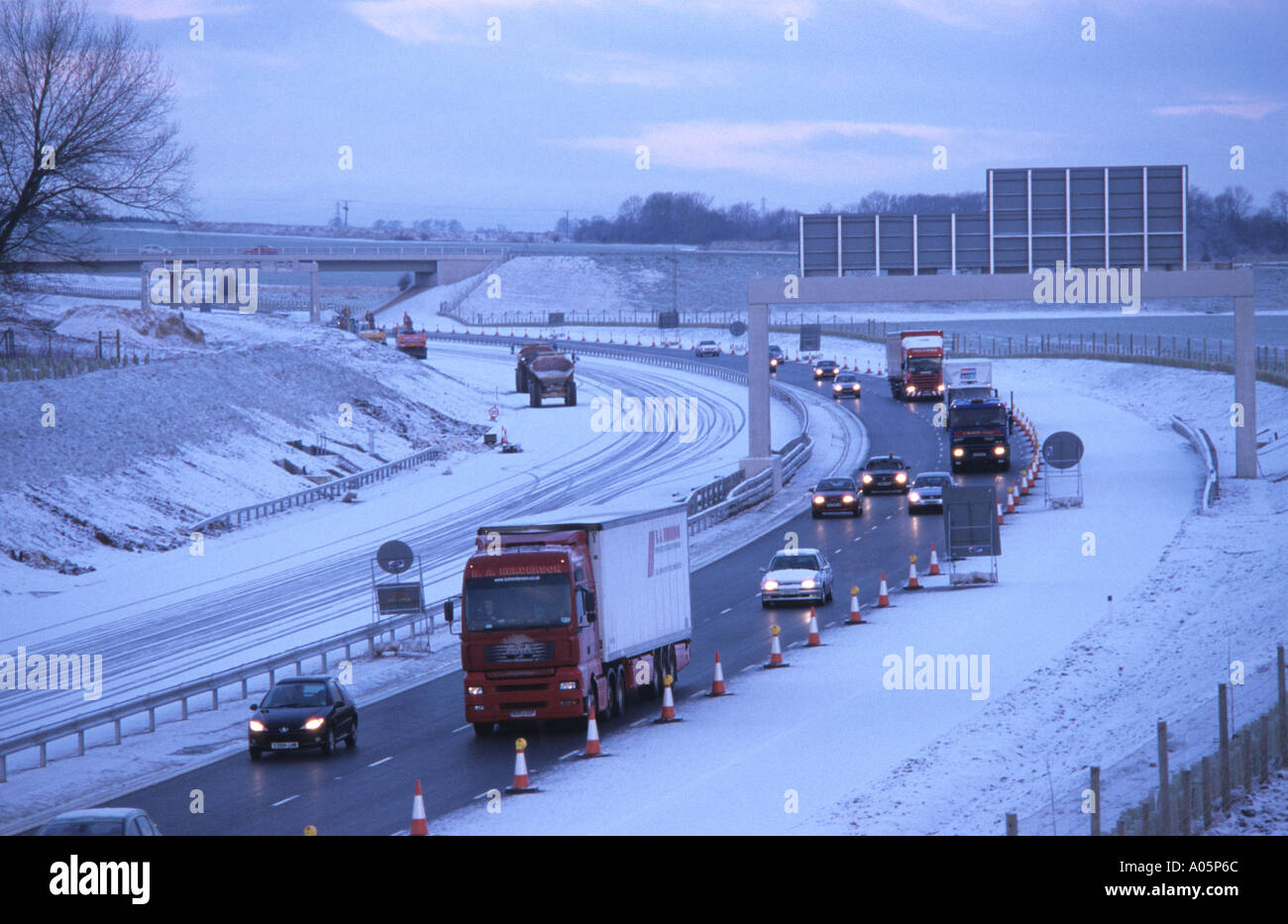 heavy traffic struggling through blizzard winter conditions on a1 m1