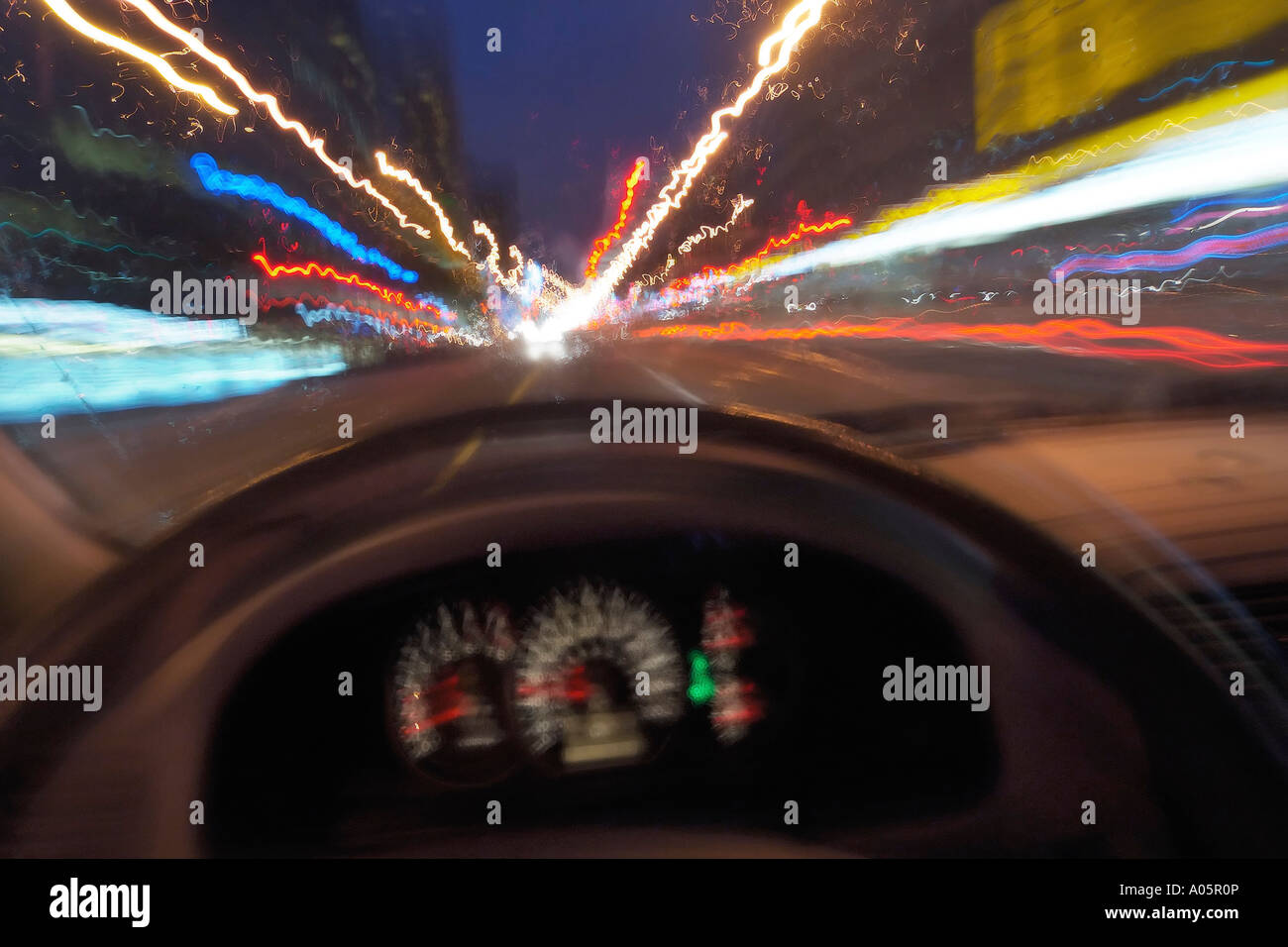 vehicle driving in the rain blurred vision DUI Drunk Driving POV Stock Photo