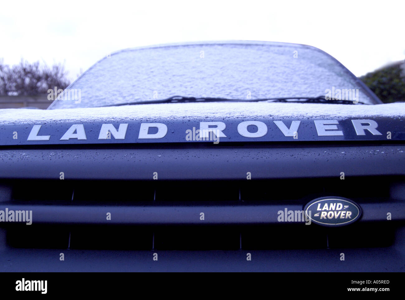 Snow frosting on the bonnet of a Land Rover Freelander Stock Photo