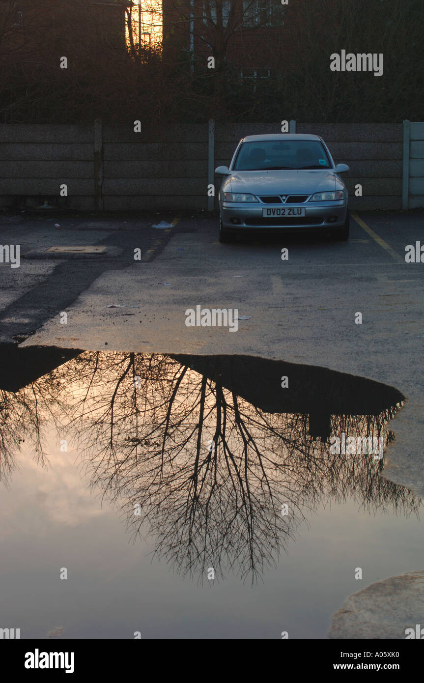 Puddle water reflections evening car hi-res stock photography and ...