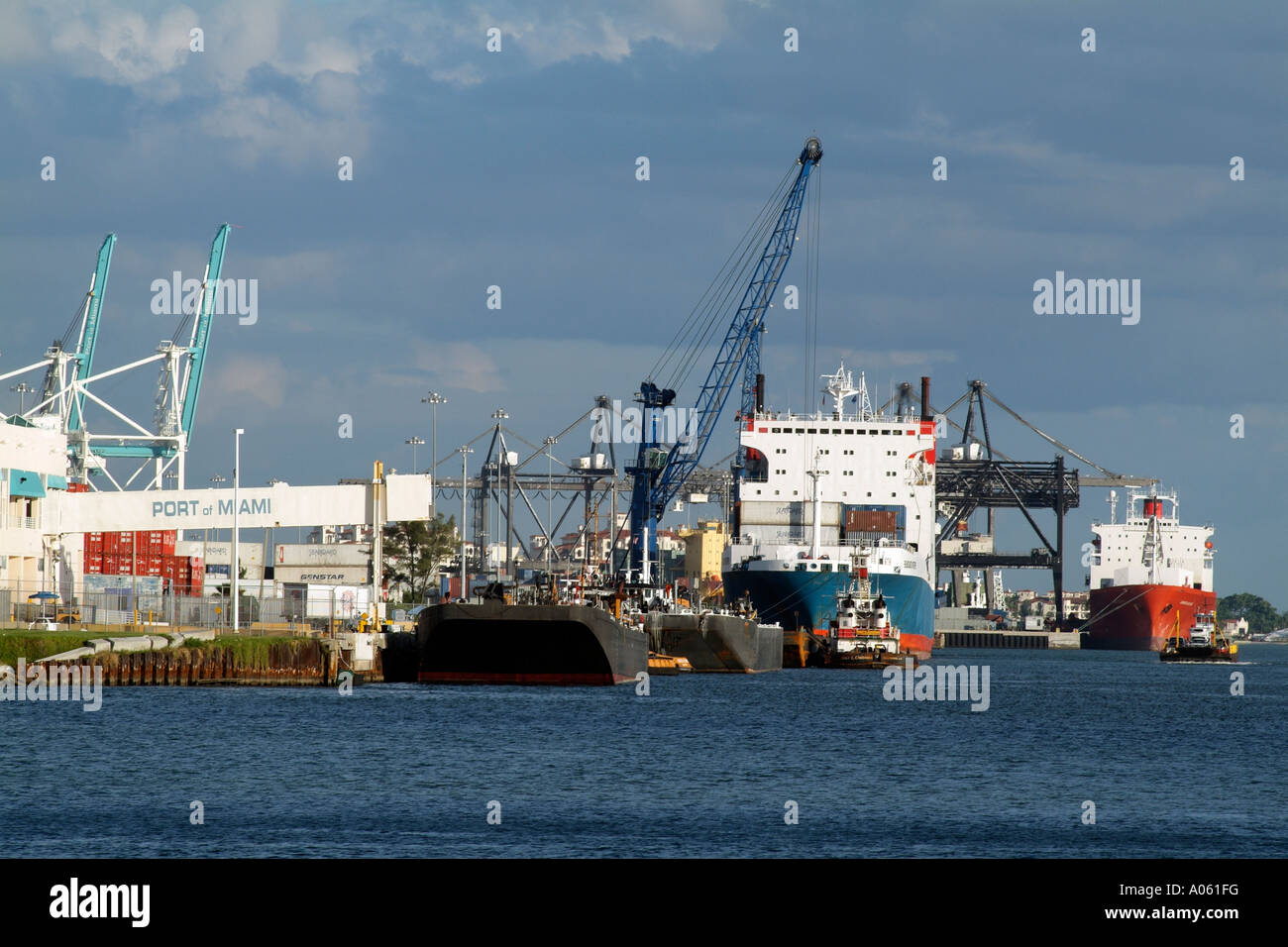 The Port of Miami Florida USA Crane unloading a ship in dock Stock Photo