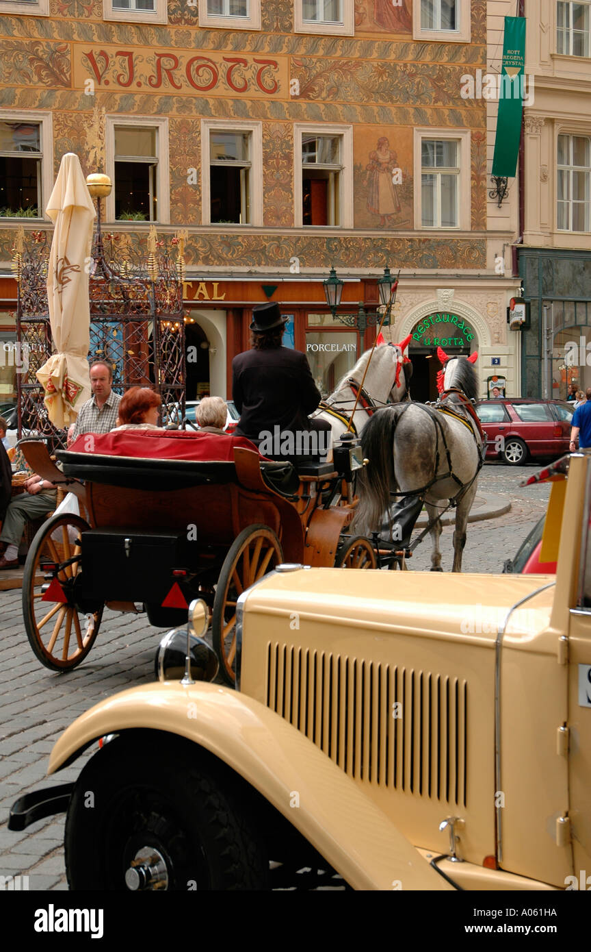 Barouche horse carriage and vintage vehicle at the old Town Square Prague Czech republic Stock Photo