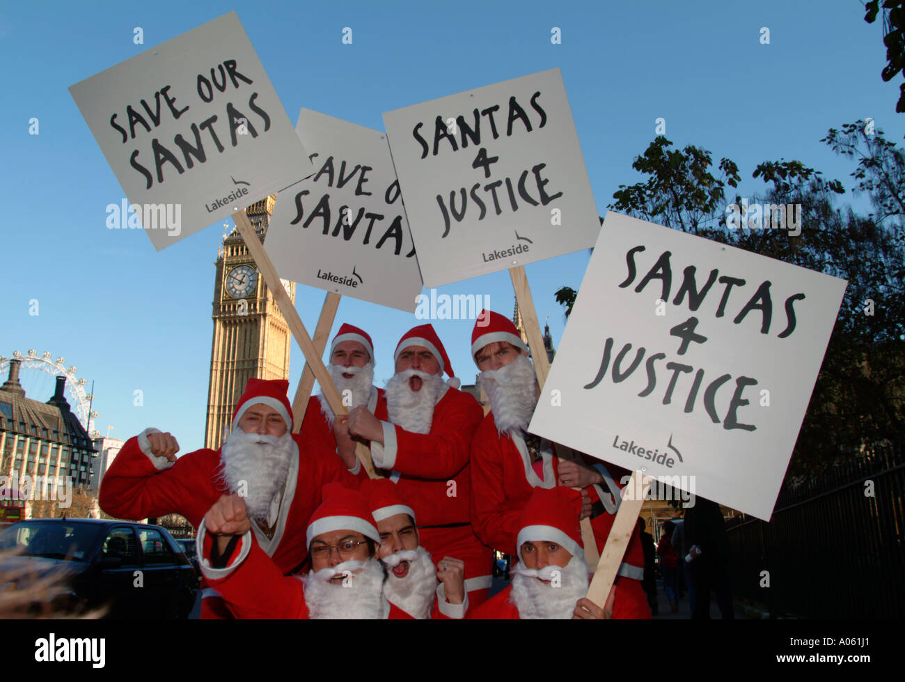 Santas outside Houses of Parliament protesting at bans on traditional
