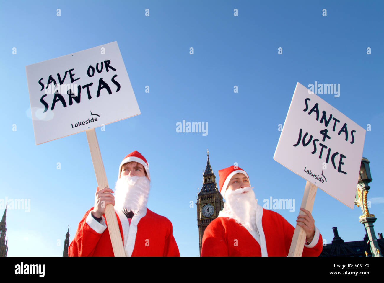 Santas outside Houses of Parliament protesting at bans on traditional