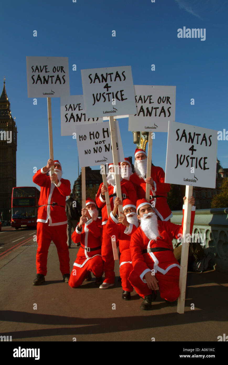 Santas outside Houses of Parliament protesting at bans on traditional