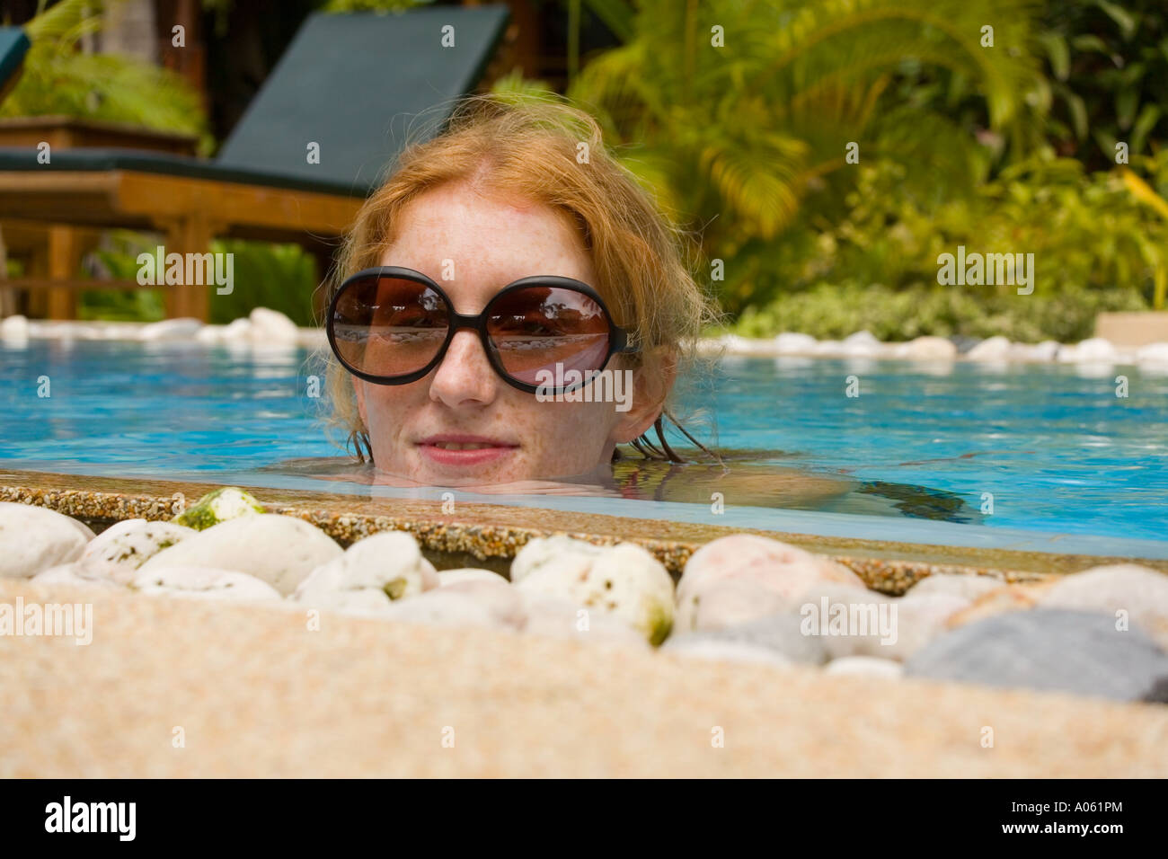 Thai woman swimming pool hi-res stock photography and images - Alamy